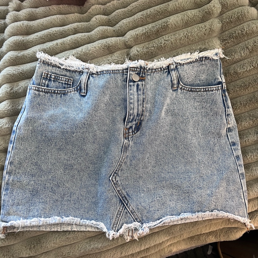 High-Rise Distressed Light Wash Denim Mini Skirt